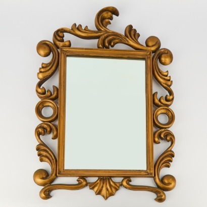 A Handcarved Wooden Gilt Mirror