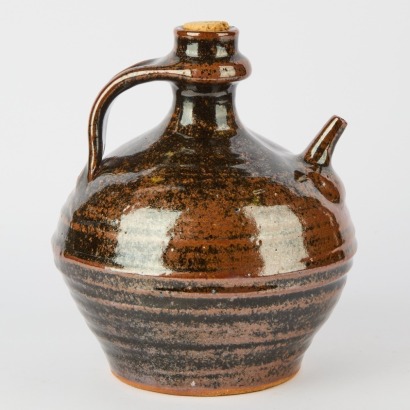 A Large Andrew Van der Putten Flagon with Sout and Strap Handle
