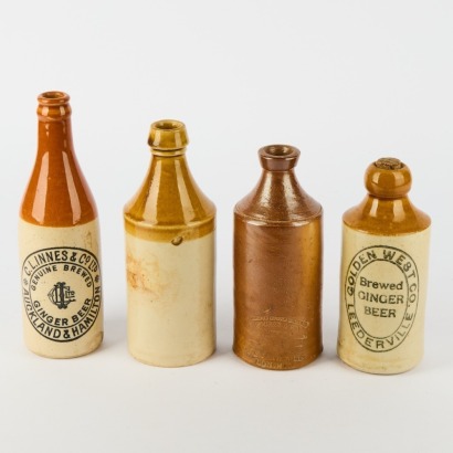 A Collection of Four Earthenware Bottles