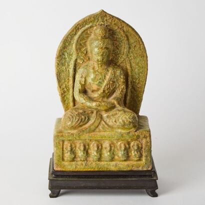 A Chinese Celadon-glazed Ceramic Seated Buddha