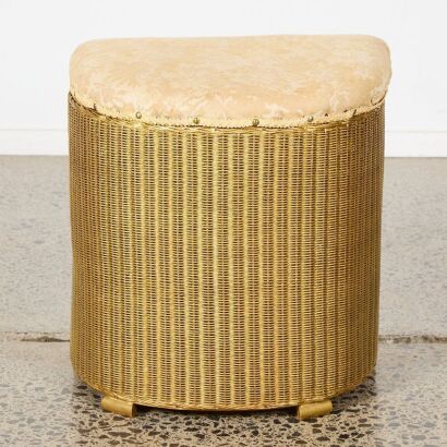A Lloyd Loom Golden Laundry Basket