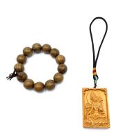 A Chinese Wooden Bracelet and a Guanyin Pendant