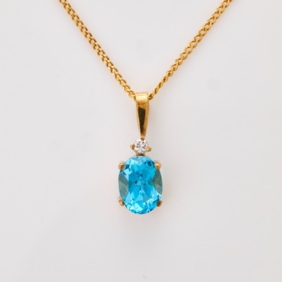 9ct Yellow Gold, Modern Oval Topaz / .02ct Diamond Pendant on 49cm Curb Link Chain