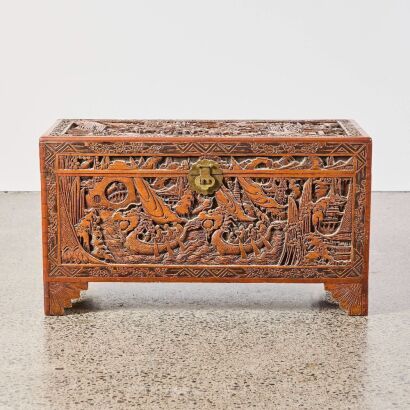 A Chinese 20th Century Carved Camphorwood Chest