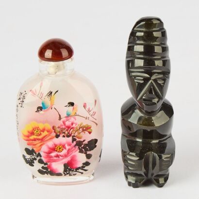 A Chinese Inside-painted Glass Snuff Bottle and A Chinese Black Crystal Carving of a Figure