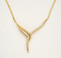 A diamond necklace, the front v-shaped section set with baguette and brilliant cut diamonds, and hung on a flattened curblink chain. Estimated total diamond weight 1.45 carats. 14ct yellow gold. Weight 15.72 grams. Length 27.5 cm. Gemmologist's report ava