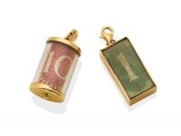 Two gold money charms, one pound, ten shillings. 9ct yellow gold.