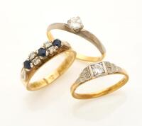 Two solitaire diamond rings and a sapphire and diamond eternity ring. 9ct and 18ct gold. Weight 8.19 grams. Sizes Q and O. 