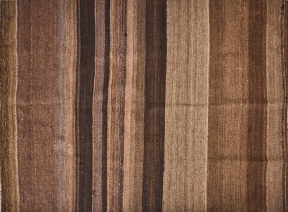 An Earth Toned Kilim Rug