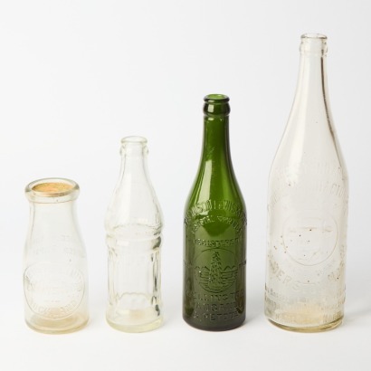 A Collection of Four Vintage Bottles