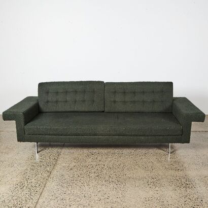 A Dark Green Boucle Sofa