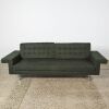 A Dark Green Boucle Sofa