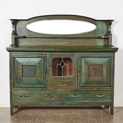 An Antique Green Oak Sideboard