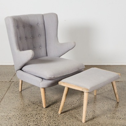 A Wingback Armchair with Footstool