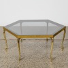 A Mid-Century Brass and Smoked Glass Coffee Table