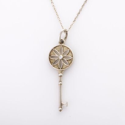 Tiffany & Co, Sterling Silver & .02ct Diamond Daisy Key Pendant Necklace