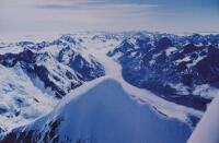 BRIAN BRAKE Climbers Stand on the Summit
of Mt. Cook, New Zealand's Highest Peak