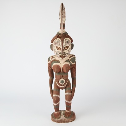 A Carved Figure with Mounted Hornbill, Papua new Guinea