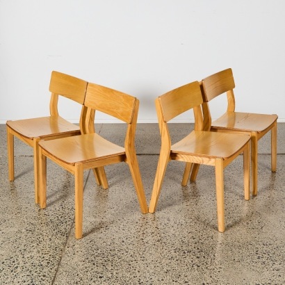 A Set of Four Solid Oak Dining Chairs