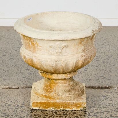 A Fleur De Lis Concrete Planter