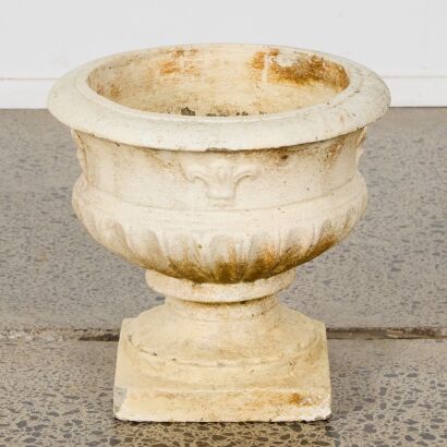 A Fleur De Lis Concrete Planter