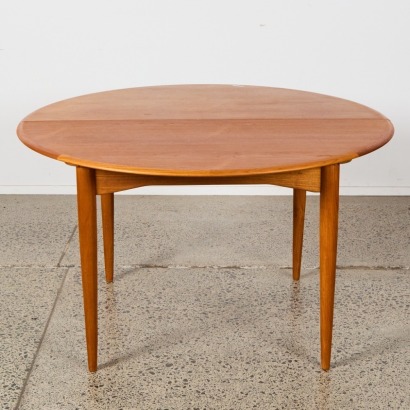 An Airest Teak Extendable Dining Table