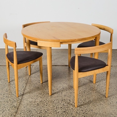 A Hans Olsen Roundette Style Dining Table With Four Nested Chairs