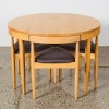 A Hans Olsen Roundette Style Dining Table With Four Nested Chairs - 2