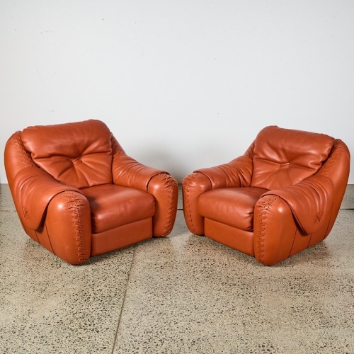 A Pair of Leather Lounge Chairs by Poltromec Italy