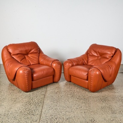 A Pair of Leather Lounge Chairs by Poltromec Italy