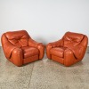 A Pair of Leather Lounge Chairs by Poltromec Italy