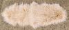 A Large Oatmeal Tibetan Lamb Rug