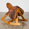 A Giddyup Saddle Stool by Tom Wigmore Design