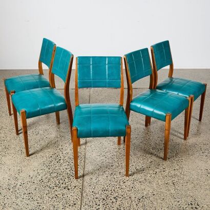 A Set of Five Mid-Century Retro Wood and Vinyl Dining Chairs