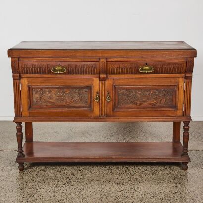 An Ornate Carved Rosewood Sideboard