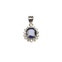 A sapphire and diamond pendant, of cluster design, set with an oval blue sapphire of known weight 1.07 carat and brilliant cut diamonds of known total weight 0.21 carat. 18ct white gold. Weight 1.67 grams. Length 17mm.