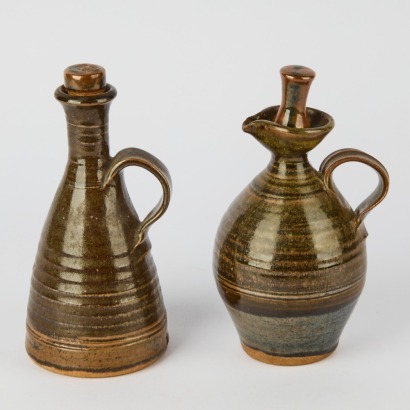 A Pair of Peter Stichbury Oil and Vinegar Jugs