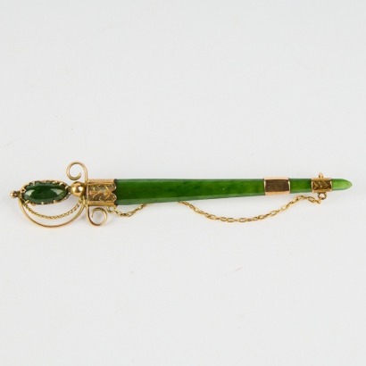 A Colonial Pounamu Sword Brooch with Gold Setting