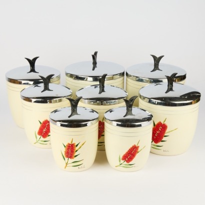 A Set of Eight Vintage Kitchen Storage Tins With Pohutukawa Decoration