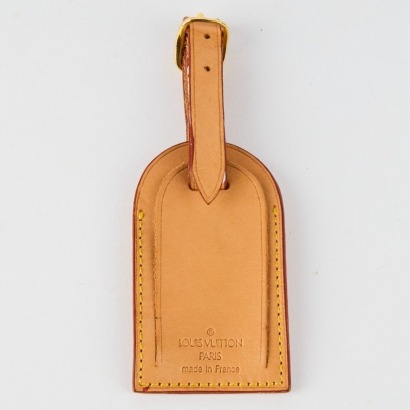 A Louis Vuitton Leather Luggage Tag