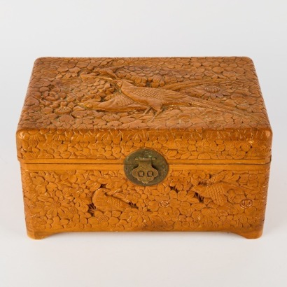 A Carved Treasure Box Featuring Pheasants And Birds