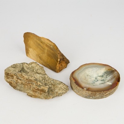 A Collection of Three Ornamental Rock Forms Two Marble And One Rock Fossil