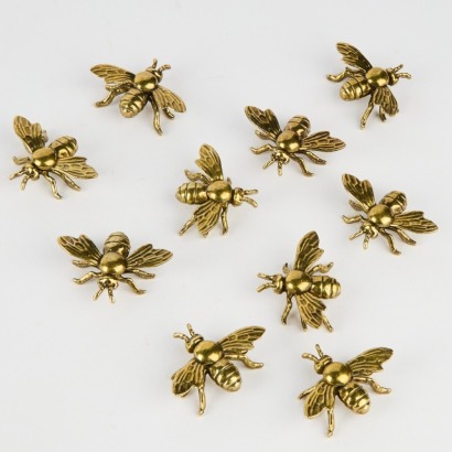 A Collection of Ten Brass Bees