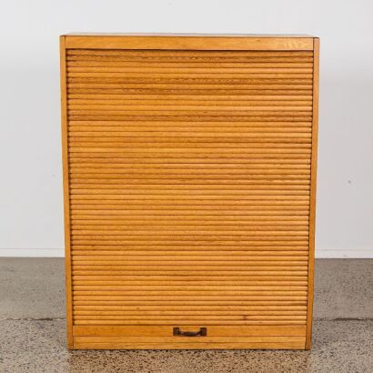 A Mid-Century Oak Tambour Roll-Front Cabinet