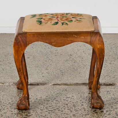 A Vintage Claw Legged Stool With Embroidered Seat