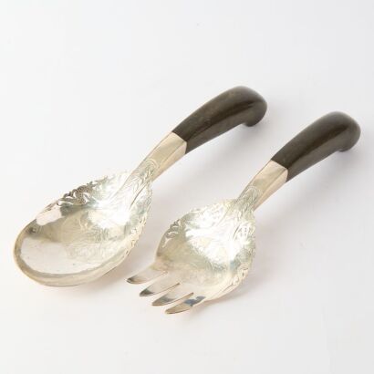 A Set of Two Indonesian Sterling Silver Spoons with Horn Handles