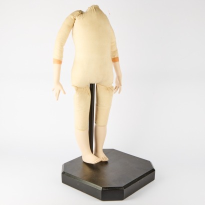A Vintage Childs Mannequin On Stand