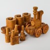 A Wooden Train by Bill Hammond - 2