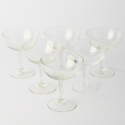 A Set of Six Etched Champagne Coupes