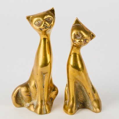 A Pair of Brass Cat Ornaments